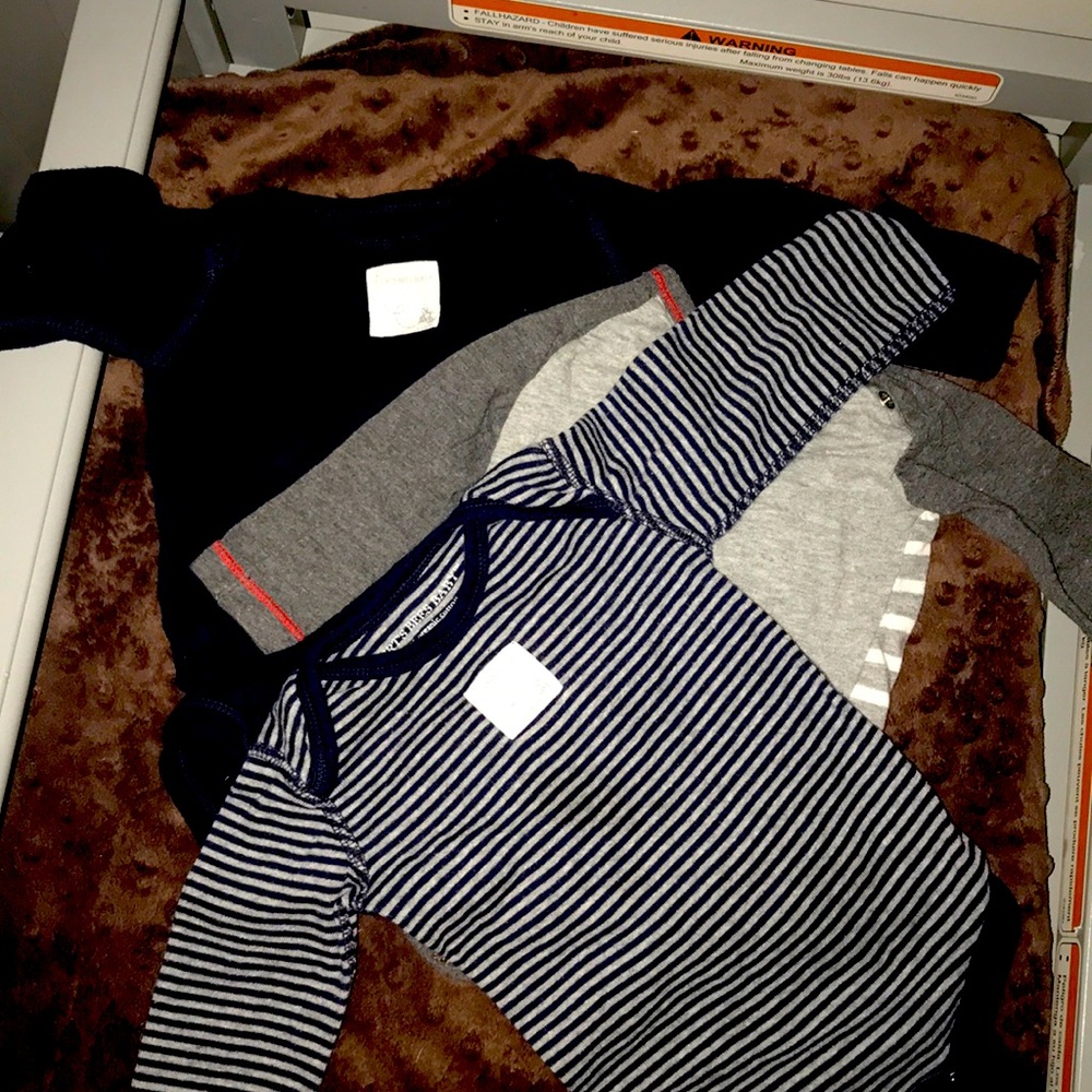 Lot of four Berts bees baby onesies